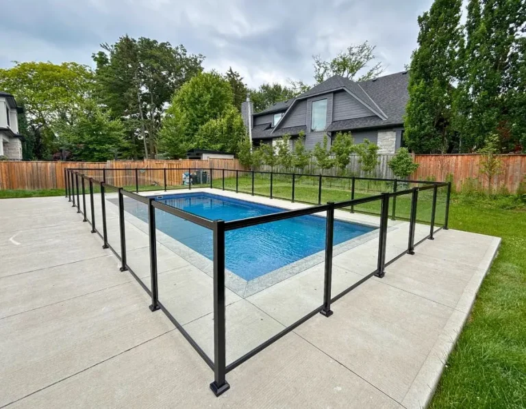 Black Glass Railing by the Pool in Canada – Canadad Deck and Rail
